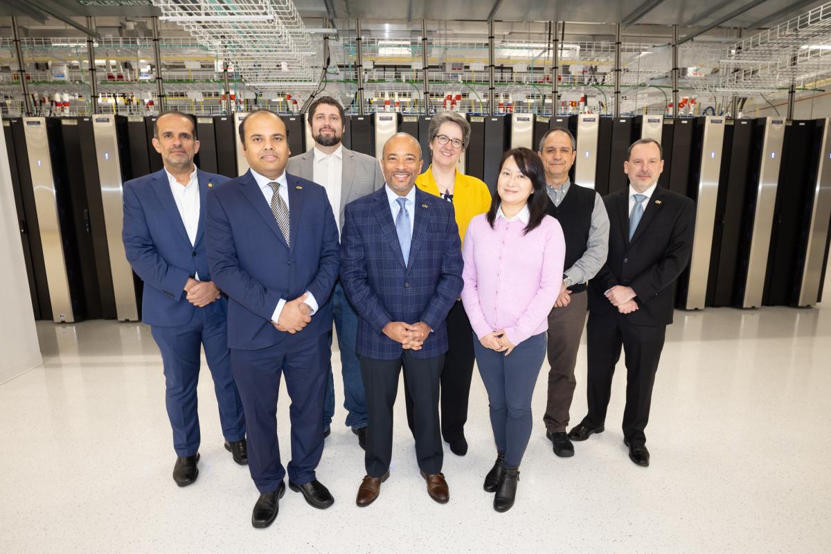 group of people standing in AI Makerspace