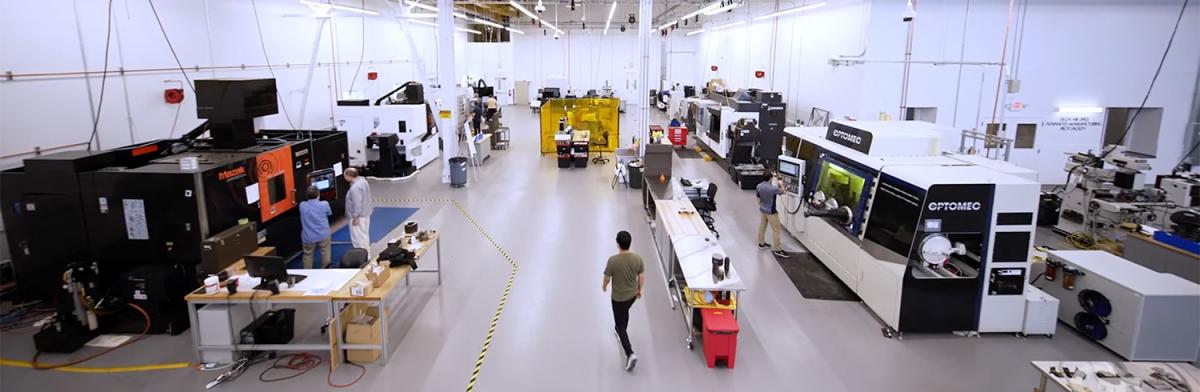 an overhead view of the Advanced Manufacturing Pilot Facility with people and machinery