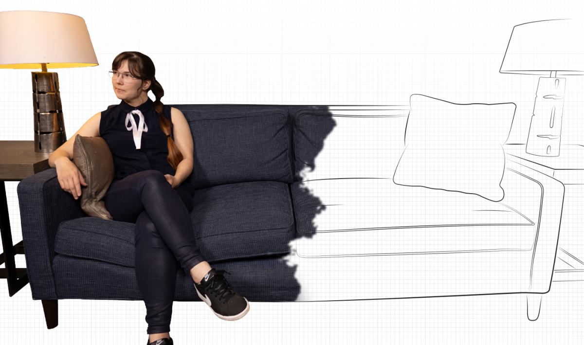 A photo of a woman sitting on couch that fades out to a line drawing on a grid background