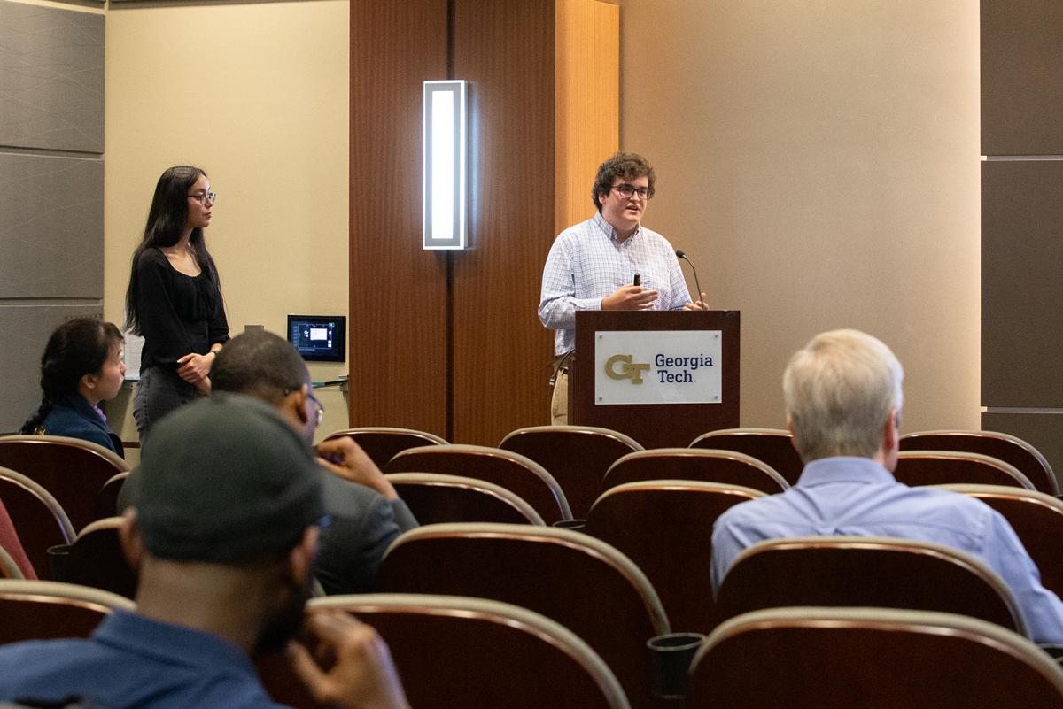 Alfonso Lagares de Toledo at a podium tells an audience about his team's ideas for supporting international students in aerospace engineering. (Photo: Veronica Soroka)