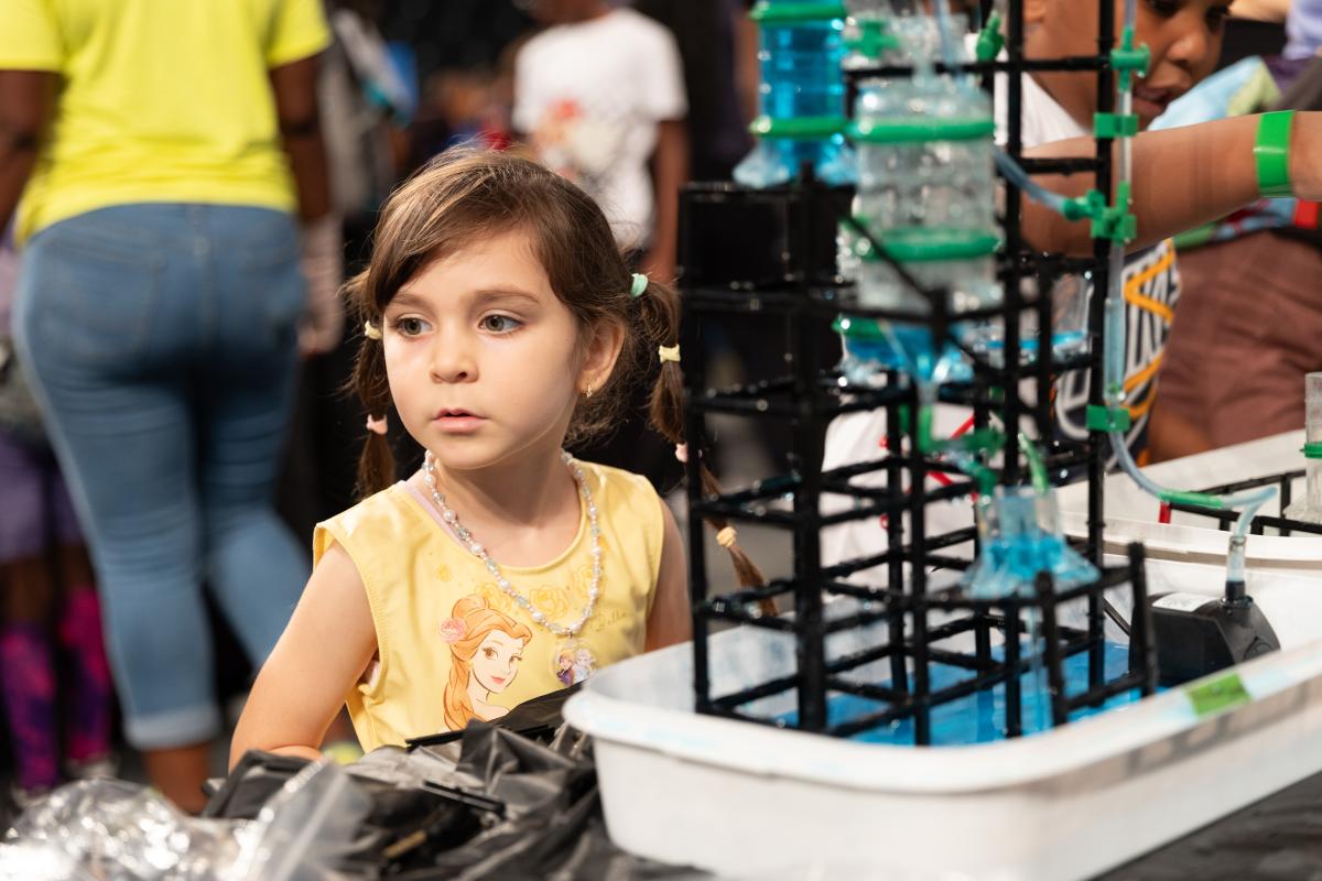 young girl with science experiment