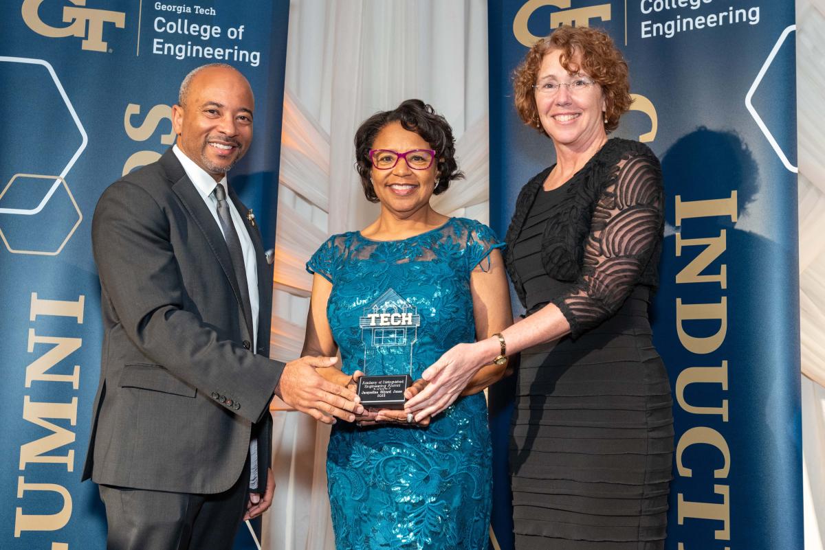Jacqueline Gilyard Jones receives award from Raheem Beyah and Sandy Magnus