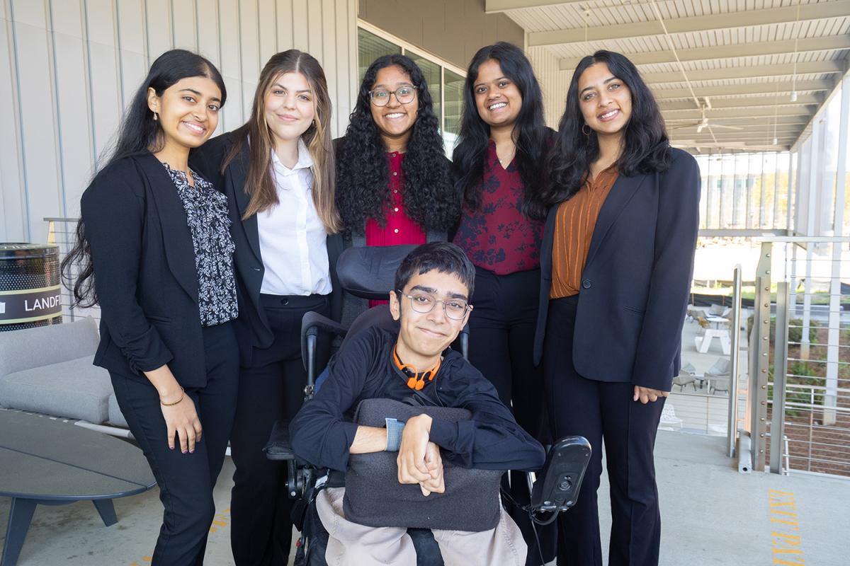 The NavigateAbility team poses after the final presentations. Front, Saif Aslam. Standing, from left, Sneha Vashistha, Hannah Koppel, Kripa Kannan, Diya Kaimal, and Nalini Dutt.