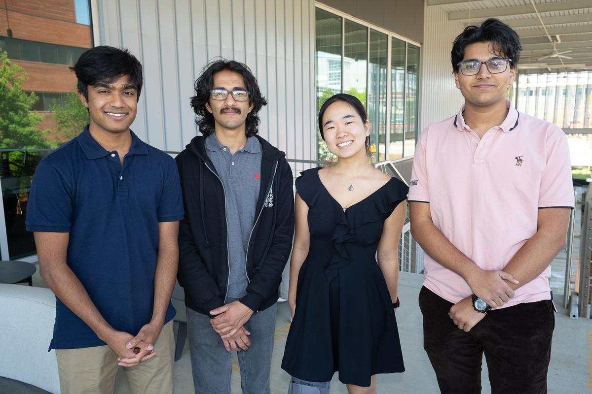 The OpenPlate team poses after the final presentations. From left, Jaisen Soundar, Niyanth Mahesh, Christina Wu, Aadit Bansal.