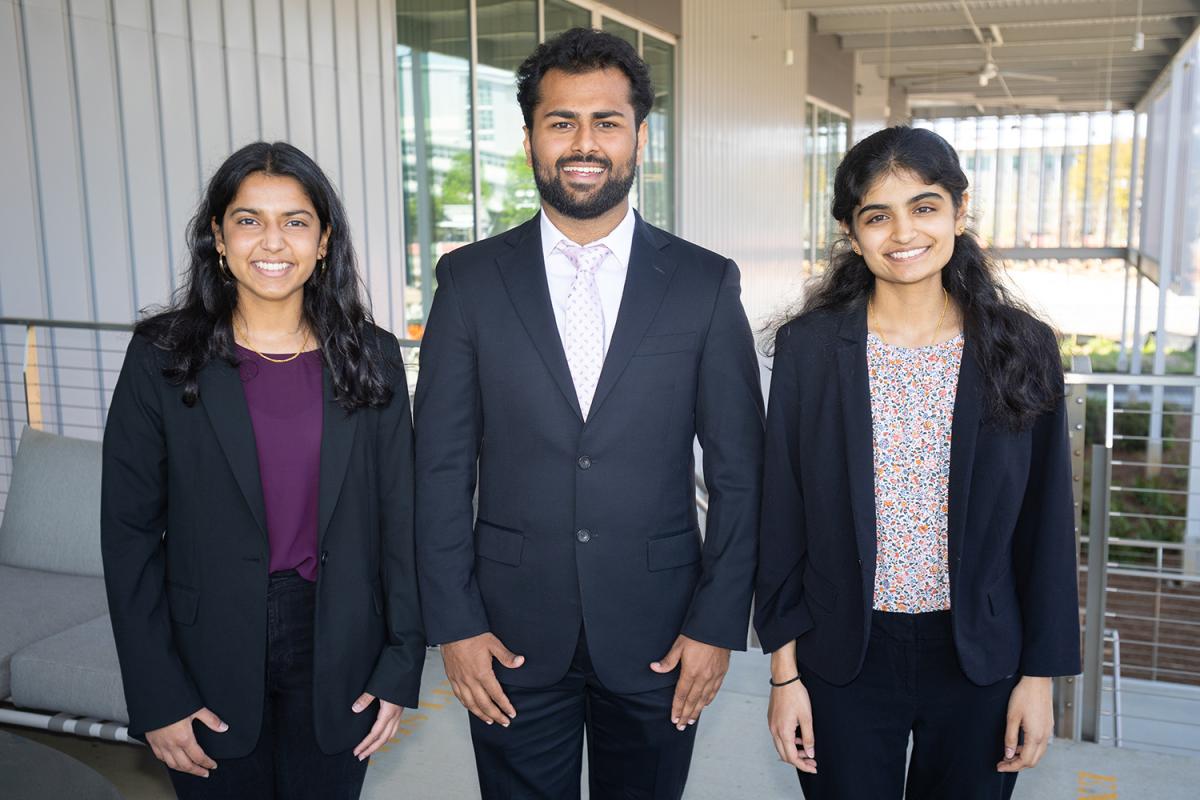 The OneByFour team poses after the final presentations. From left, Ishita Raghuvanshi, Devansh Kaushik, and Gayatri Kumar.