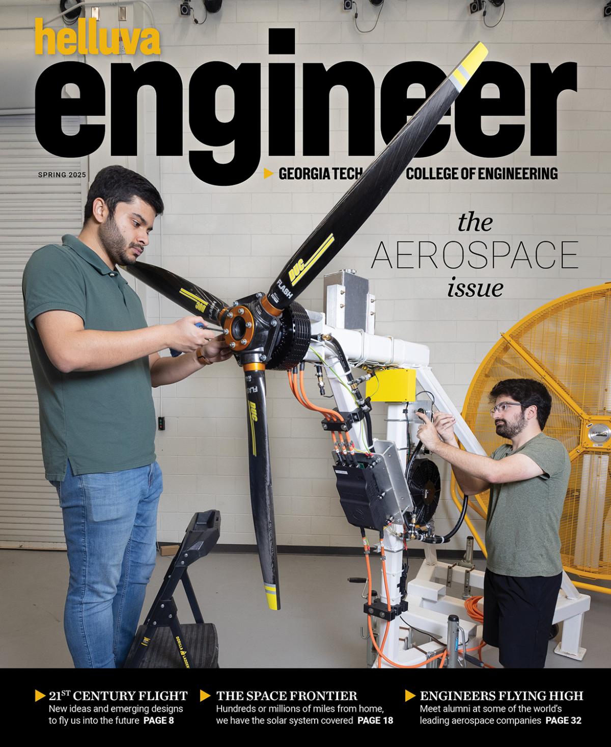 a magazine cover with two people working on a propeller