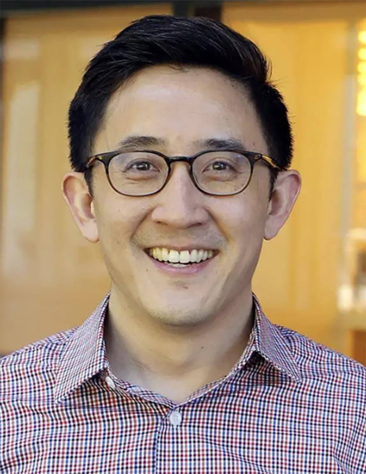 Gabe Kwong smiling at camera