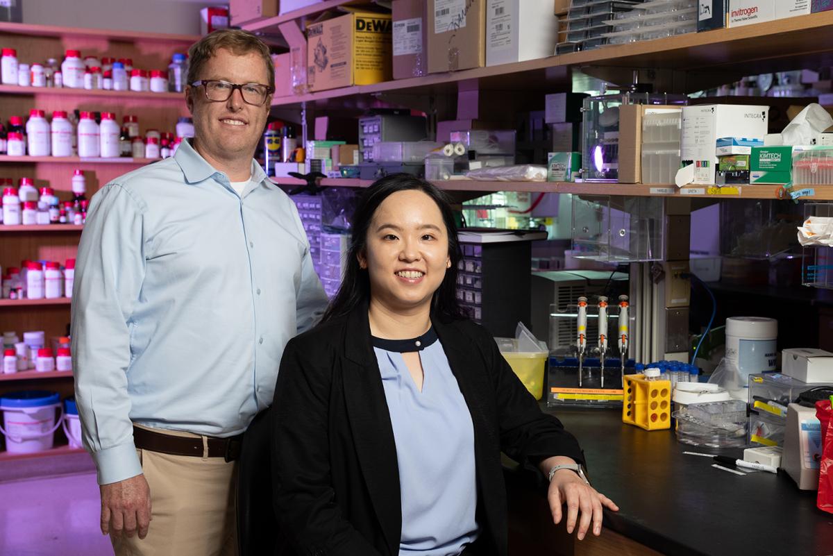 Brandon Dixon and Shao-Yun Hsu pose in their lab, where they're working on a project to improve lymph node transplant surgery.