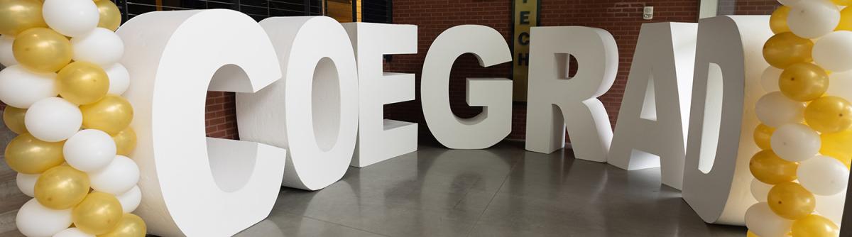 COE GRAD lettering