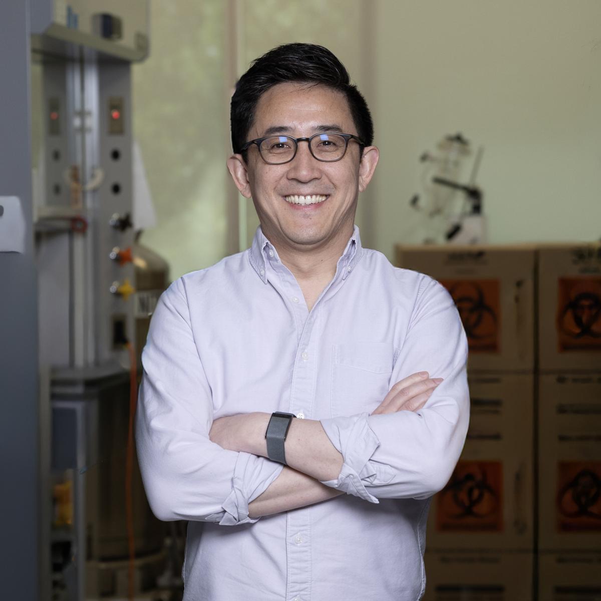 Gabe Kwong poses in his lab.