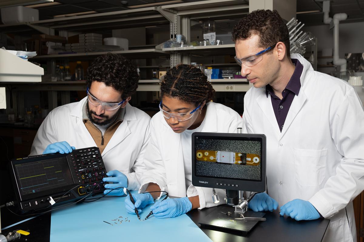 a group of people test an implantable device in the lab