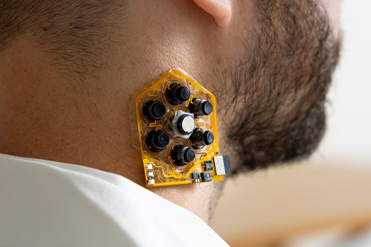 a haptic patch on a user's neck