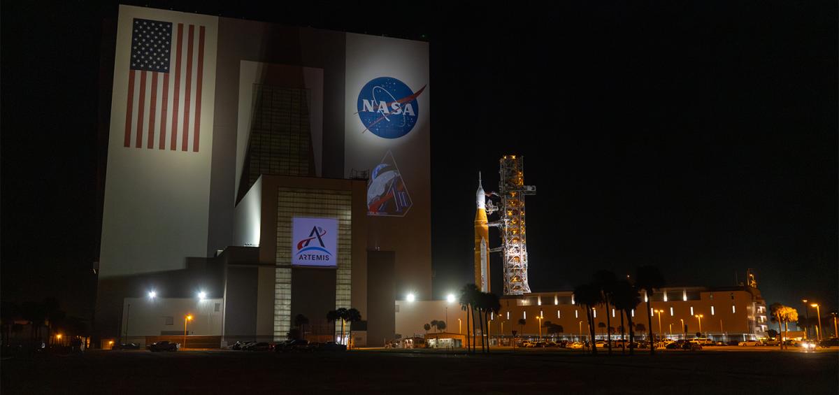 The Artemis II SLS rocket and Orion spacecraft leave the Vehicle Assembly Building 