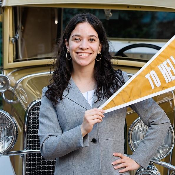 Zeina Rmaile poses in front of the Ramblin' Wreck.
