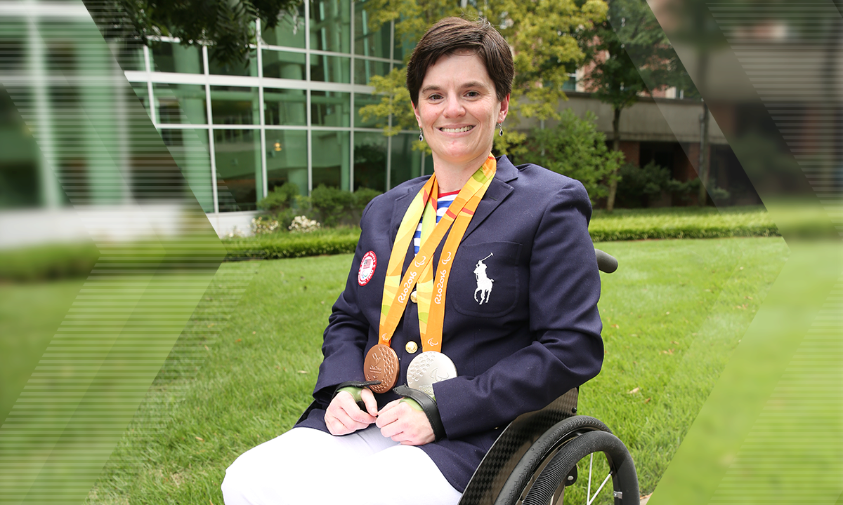 Wearing her opening ceremony outfit from the 2016 Rio Paralympics, Mitchell proudly displays her silver and bronze medals. She's planning on bringing home the gold at the 2020 Paralympic Games in Tokyo. 