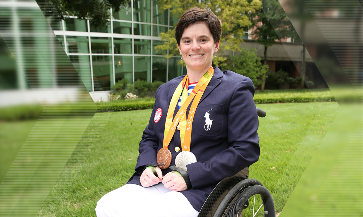 Wearing her opening ceremony outfit from the 2016 Rio Paralympics, Mitchell proudly displays her silver and bronze medals. She's planning on bringing home the gold at the 2020 Paralympic Games in Tokyo.