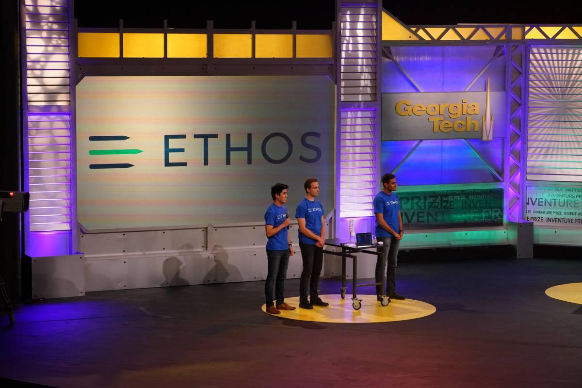 Ethos Medical on stage presenting their invention, photo