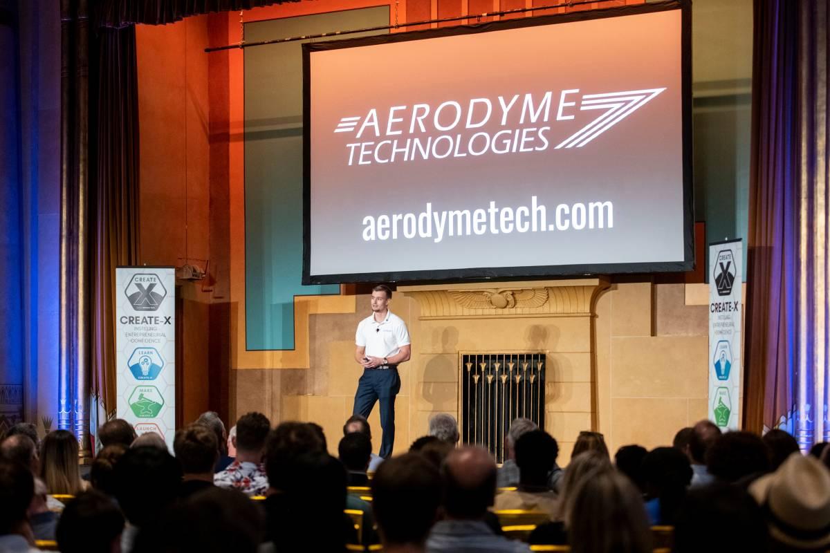 Student teams pitch their startups at Demo Day.