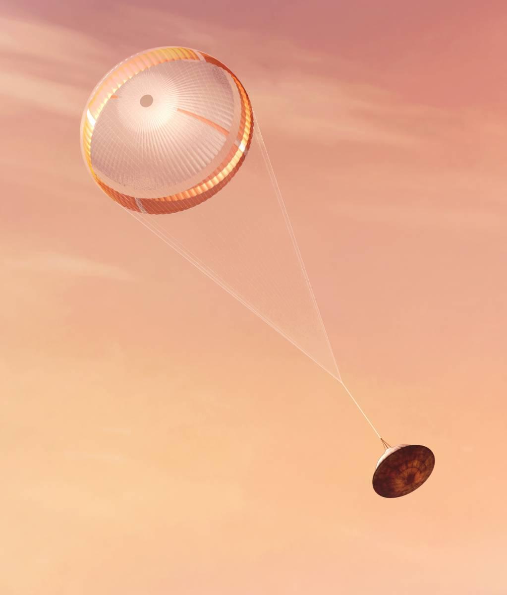 NASA’s Perseverance rover deploys a supersonic parachute from its aeroshell as it slows down before landing, in this artist’s illustration. Hundreds of critical events must execute perfectly and exactly on time for the rover to land safely on Feb. 18, 2021.