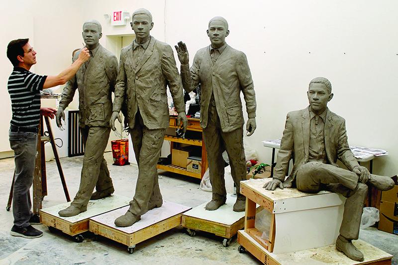sculpture work being done on the trailblazers monument