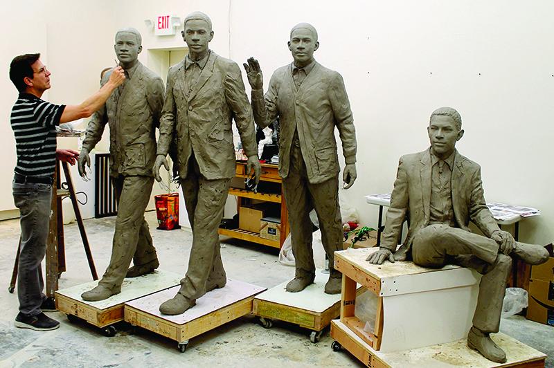 sculpture work being done on the trailblazers monument 