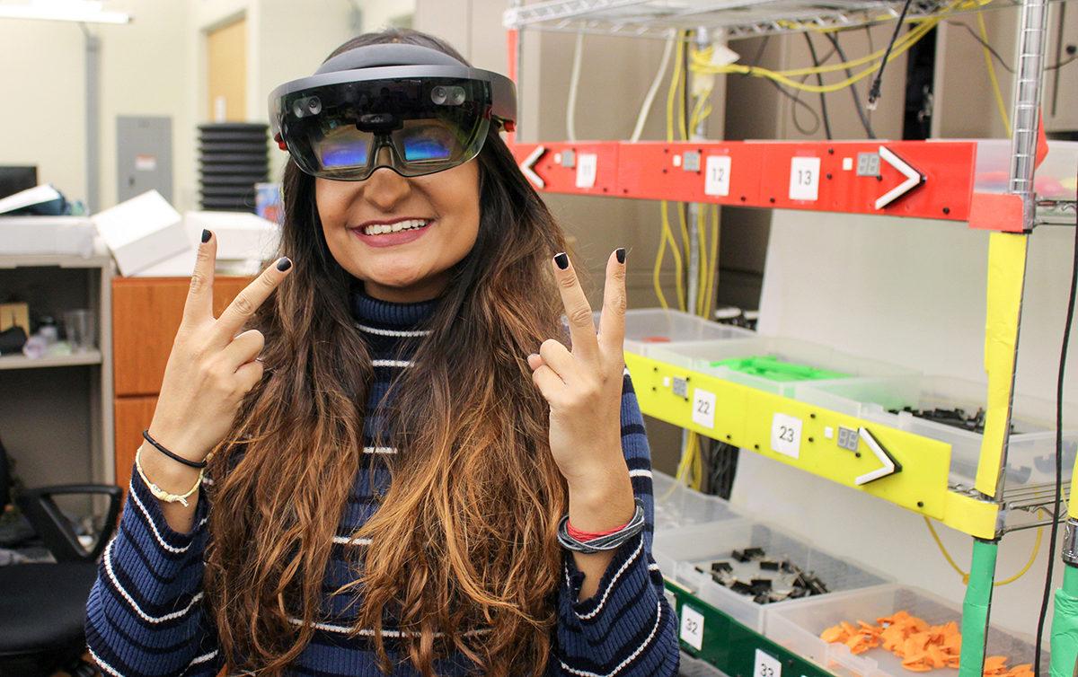 Charu Thomas wearing Oculogx AR glasses