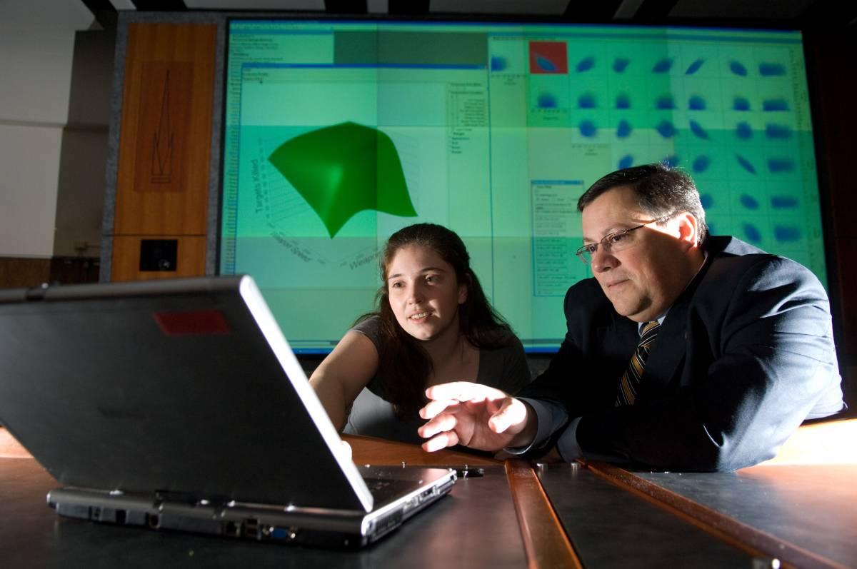 Marvis in computer lab with student