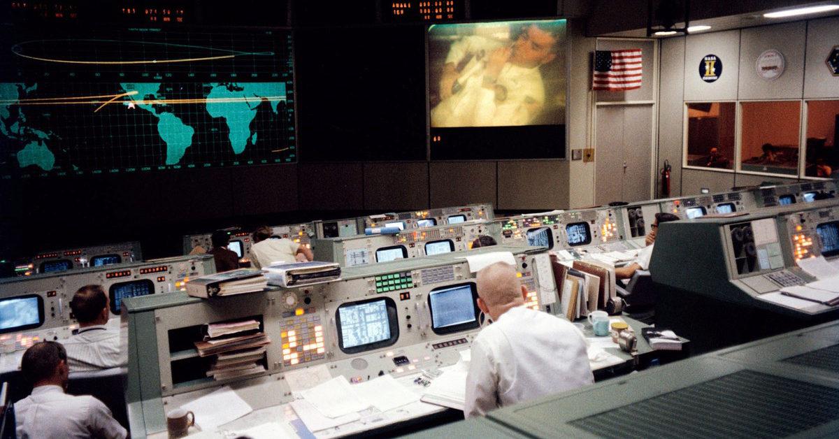 A view of the Mission Operations Control Room during a television transmission from the Apollo 13 mission in space.