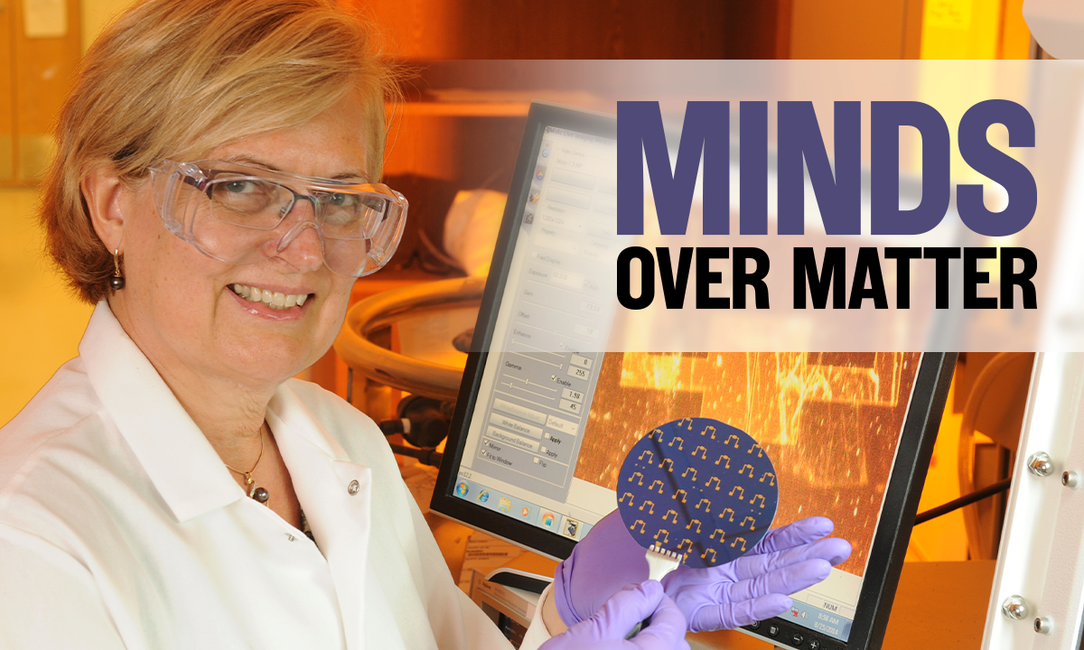 woman in lab in front of computer