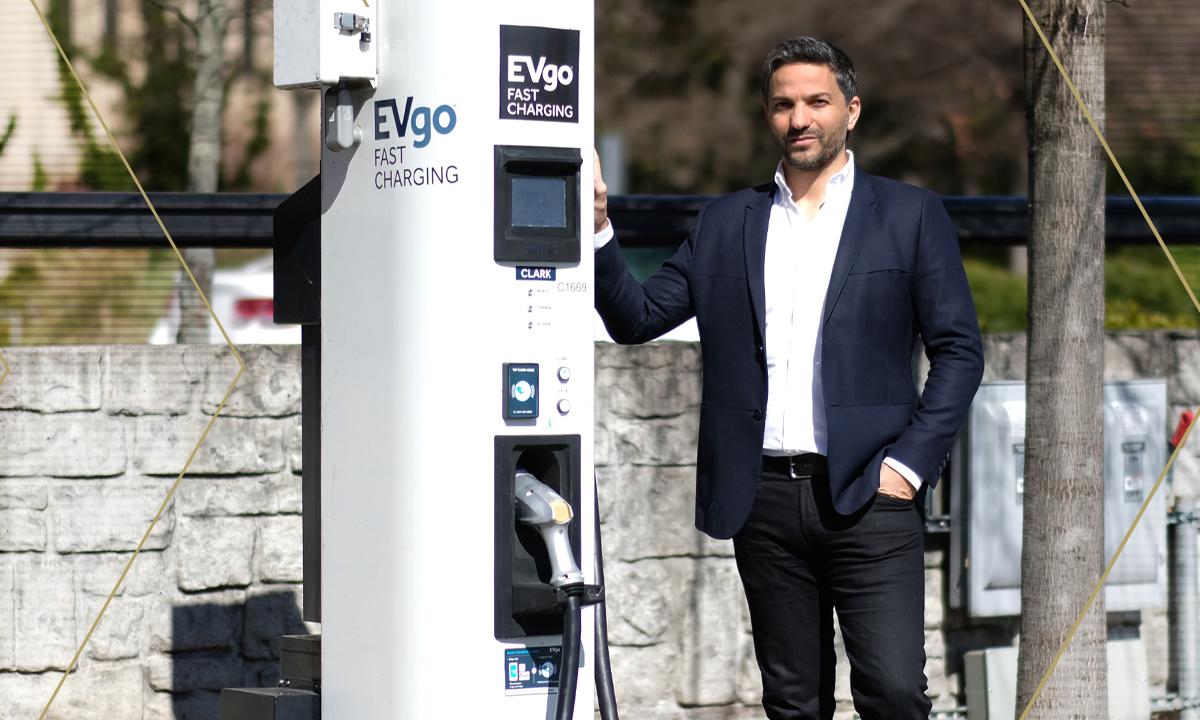 Gleb Yushin next to EV charger